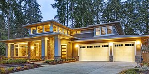 The Designer's Choice garage door in white with decorative glass inserts.