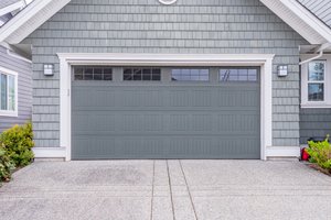 The Olympus garage door in dark gray.